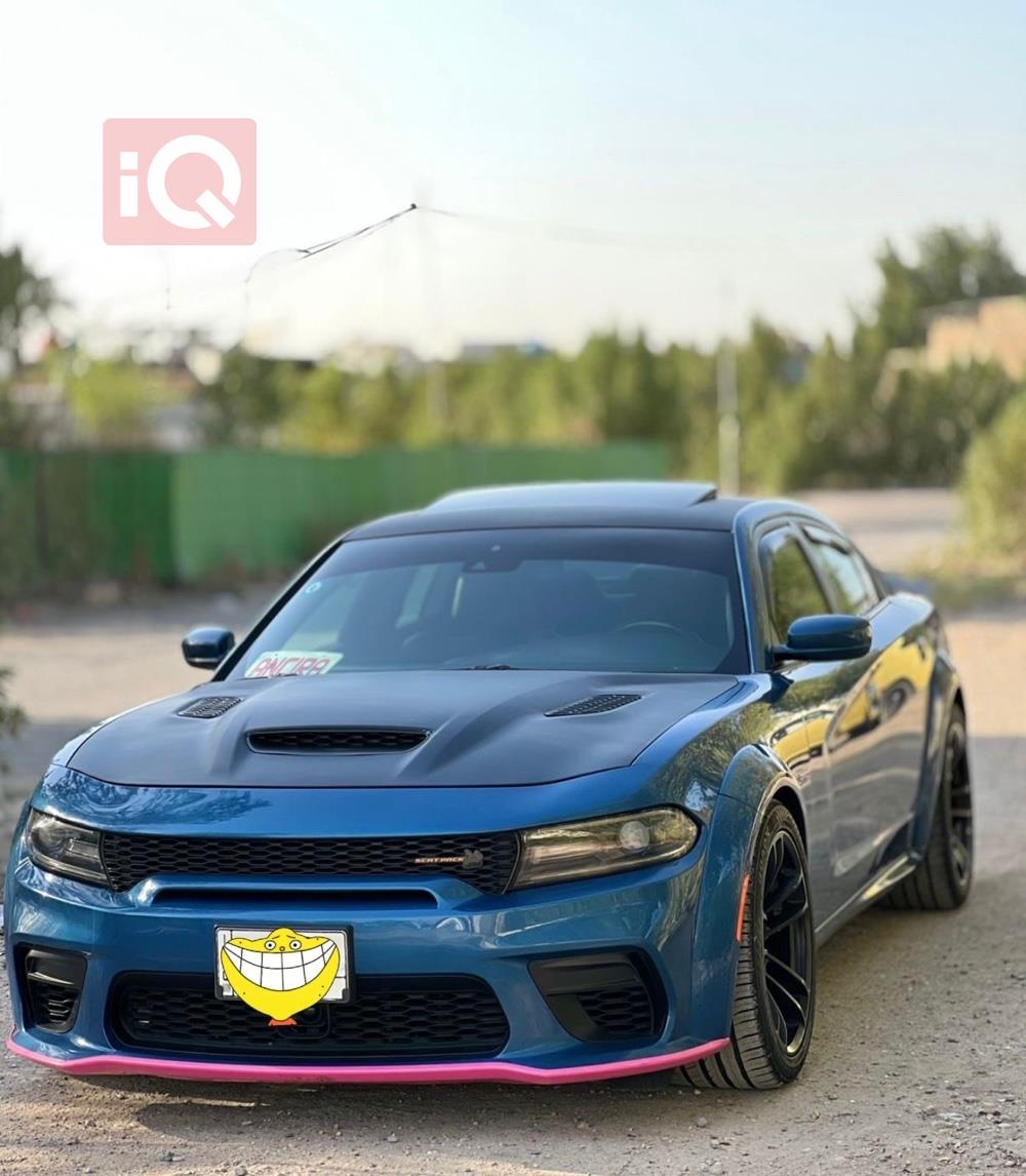 دۆج چارجەر